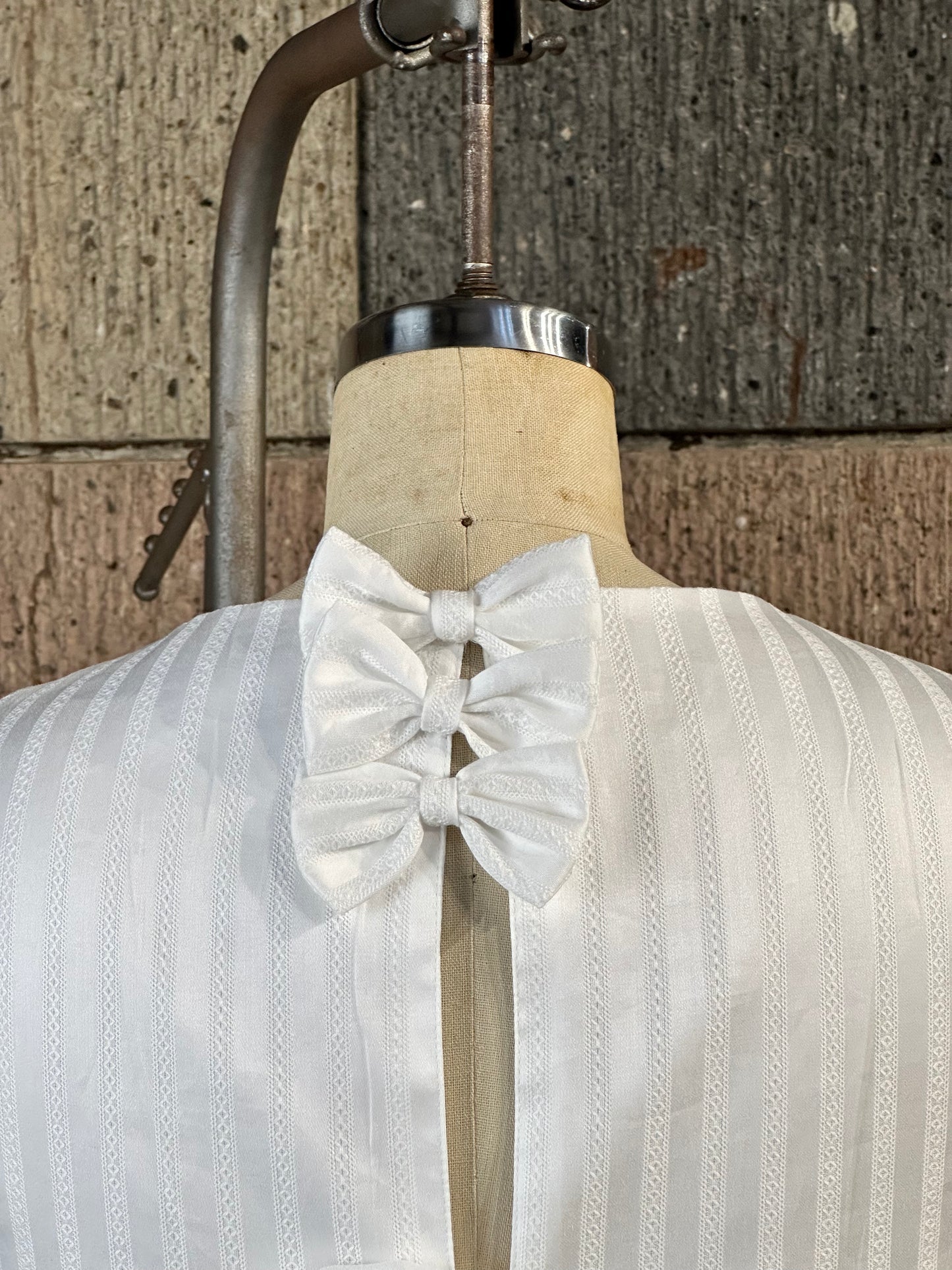 Bow Open Back Top in White Detailed Fabric